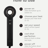 Black E9 hair dryer with usage instructions on a white background