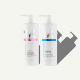 Two white pump bottles of Keraxir haircare products on a light gray background, one with a pink label and one with a blue label.
