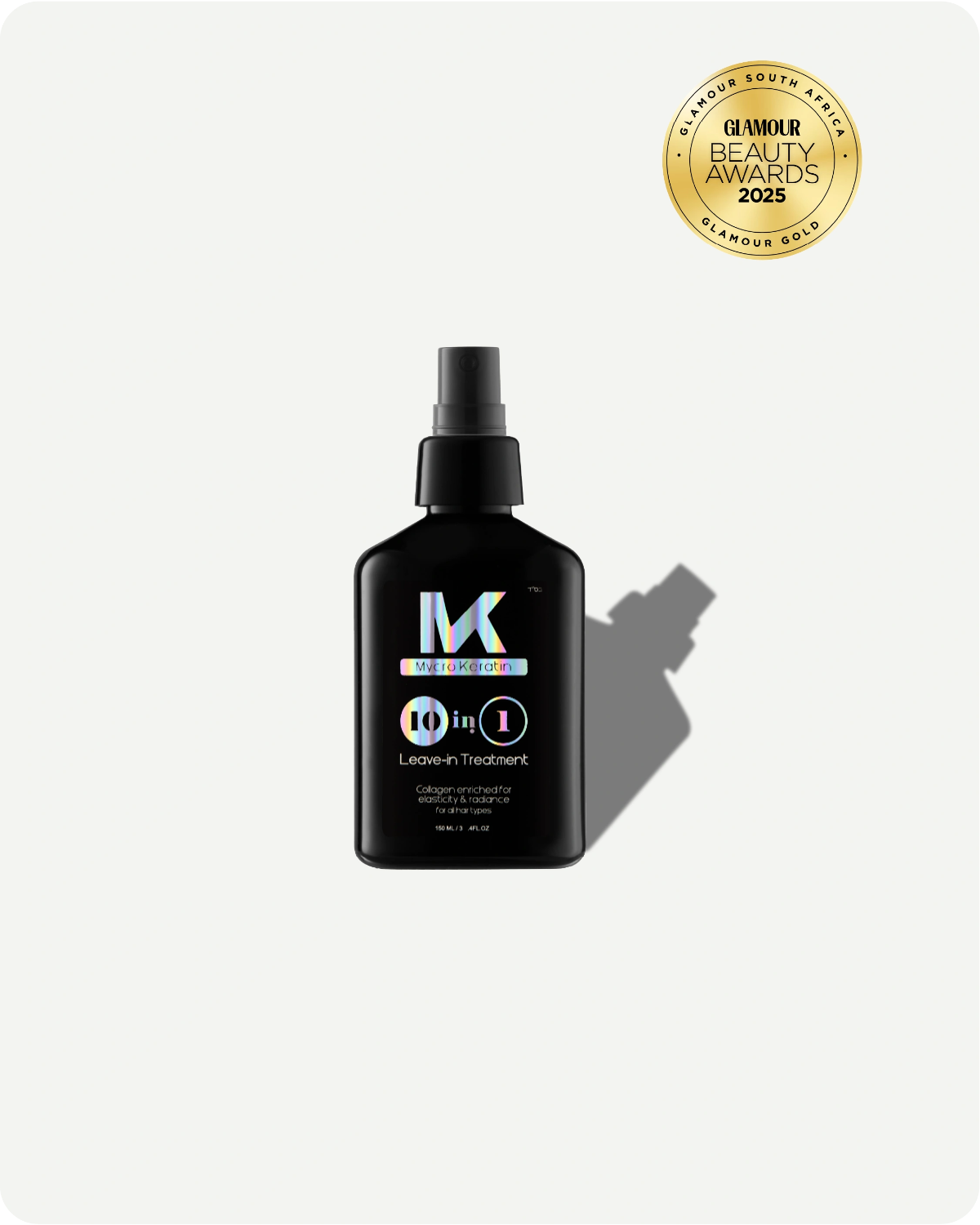 Black bottle of kroma 10 in 1 leave in treatment with a spray nozzle on a white background, featuring the Glamour Beauty Awards 2025 logo.
