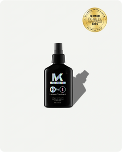 Black bottle of kroma 10 in 1 leave in treatment with a spray nozzle on a white background, featuring the Glamour Beauty Awards 2025 logo.