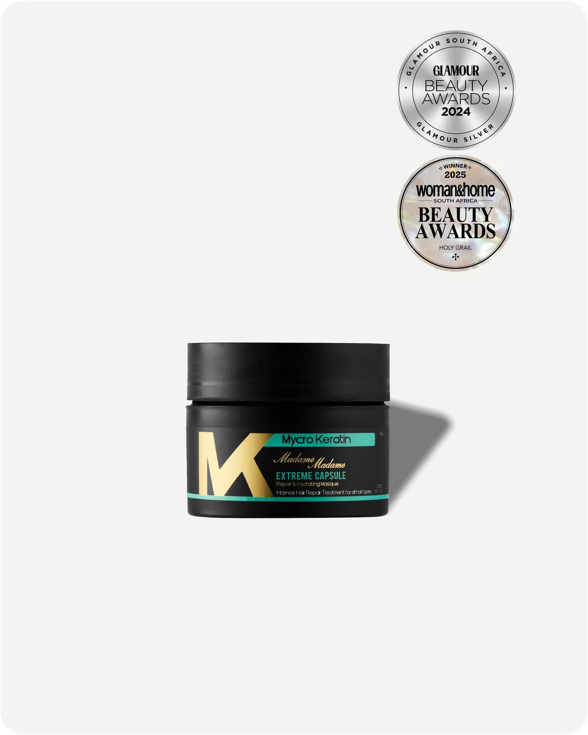 Madame Masque packaging with gold lettering on a white background, featuring awards on top.