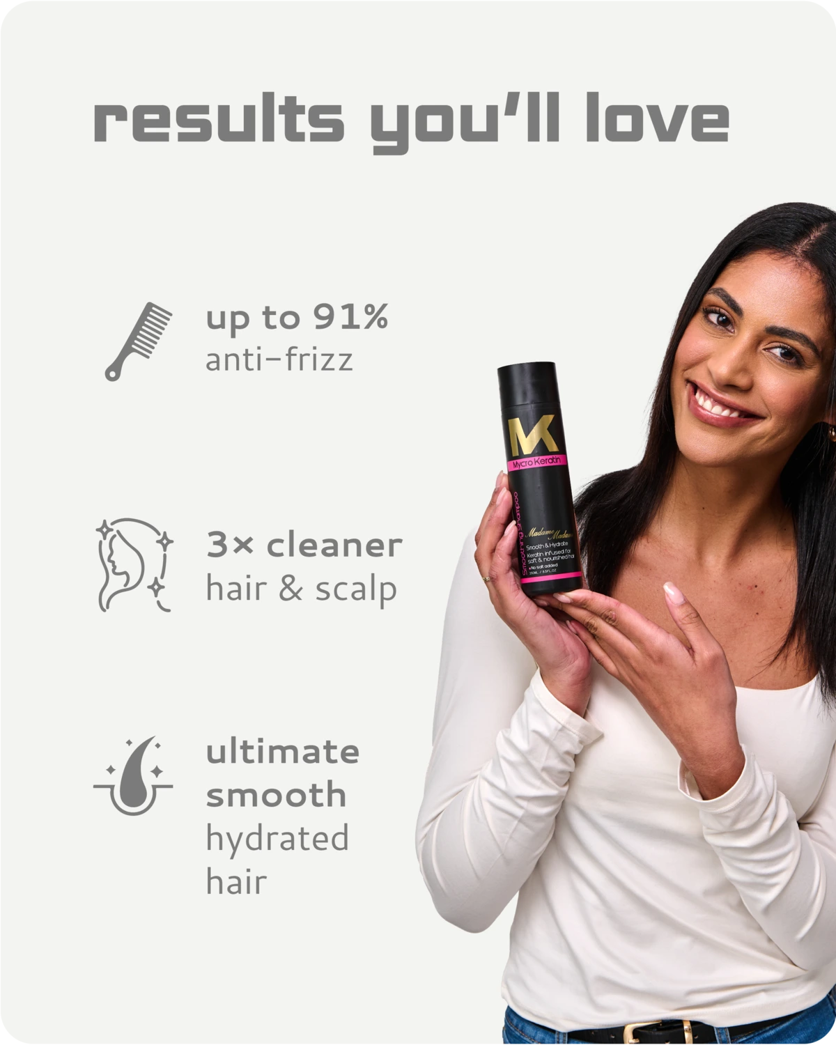 Woman holding a bottle of Madame smooth and hydrate shampoo  with text highlighting benefits on a white background