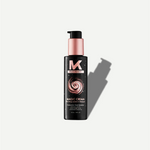 Black bottle of Magic Cream with pink pump on a white background