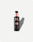 Black bottle of Magic Cream with pink pump on a white background