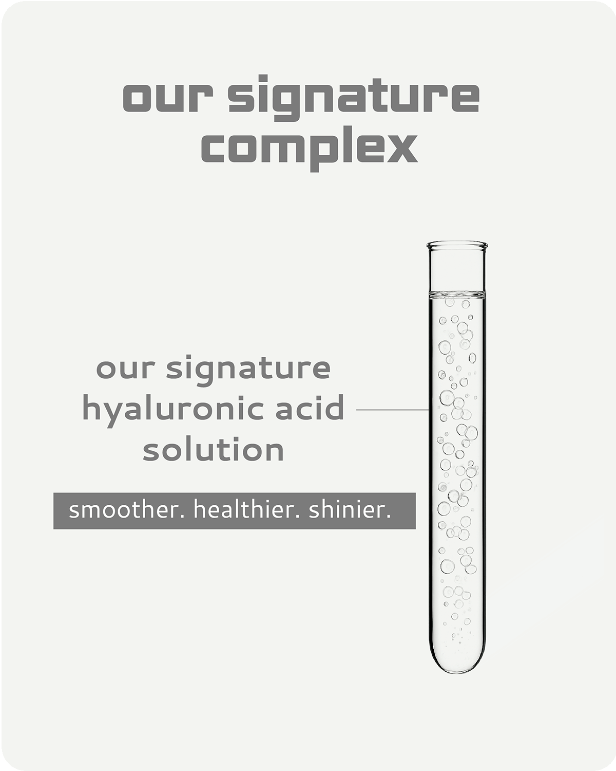 Test tube with clear liquid labeled 'our signature hyaluronic acid solution' on a light gray background.