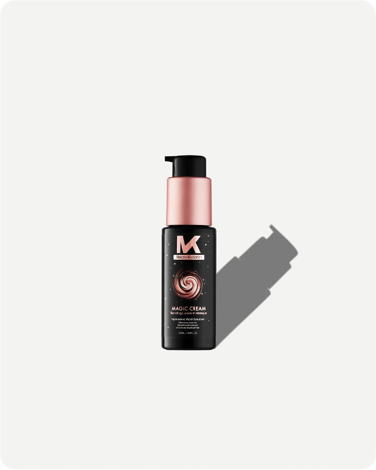 Magic Cream bottle with pink pump and black label on a white background