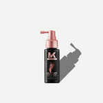 Black spray bottle with pink top on a white background, our magic mist travel size