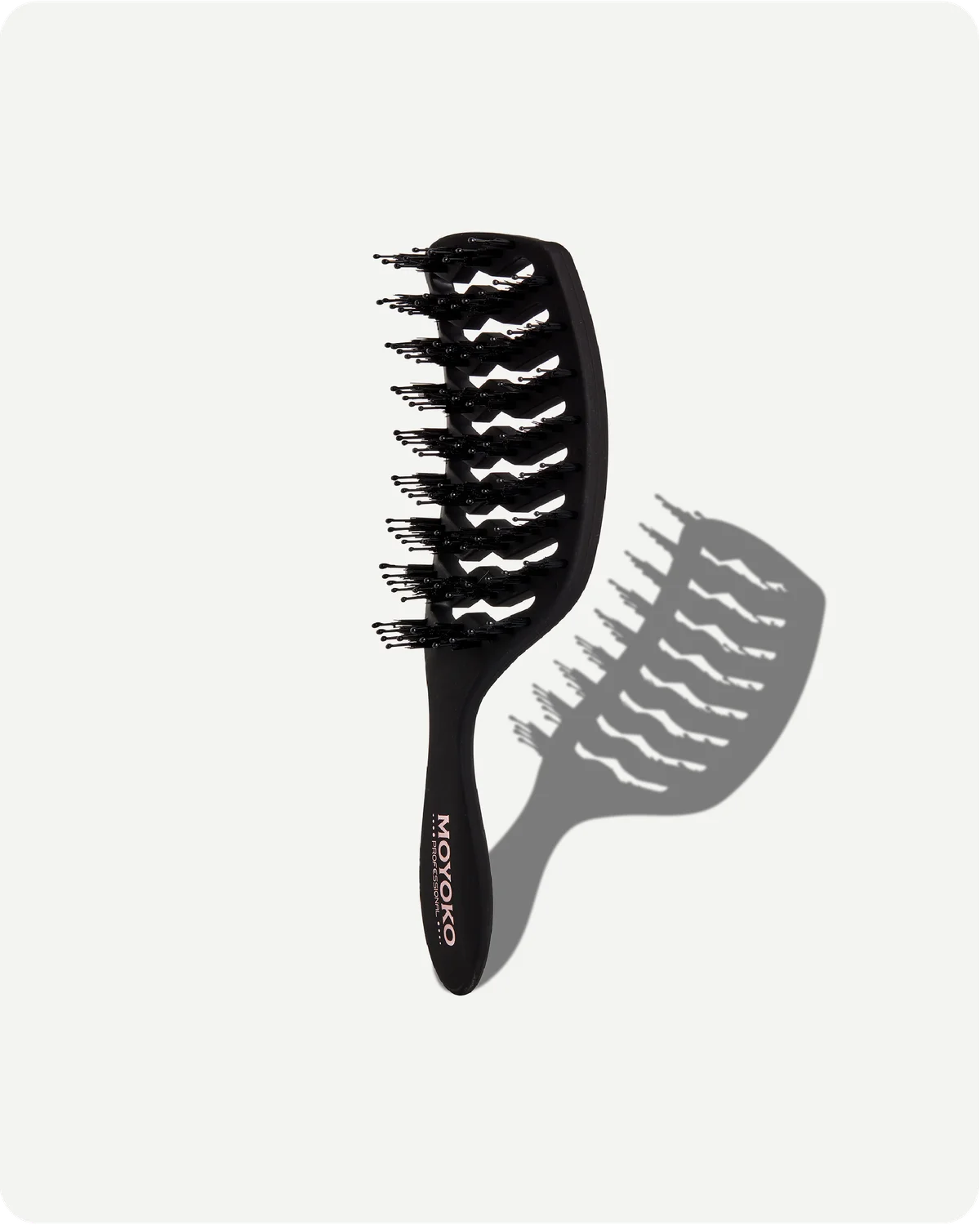 Black hairbrush with bristle design on a white background