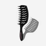 Black hairbrush with bristle design on a white background