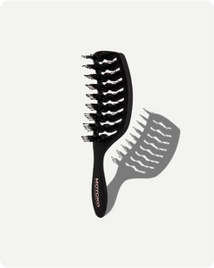 Black hairbrush with bristle design on a white background