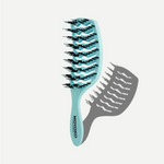 Blue hairbrush with black bristles on a white background