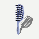 Blue hairbrush with bristle design on a white background