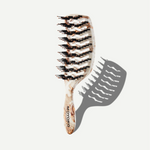 Hairbrush with tortoiseshell pattern on a white background