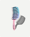 Gradient hairbrush with pink handle and blue bristle head on a white background