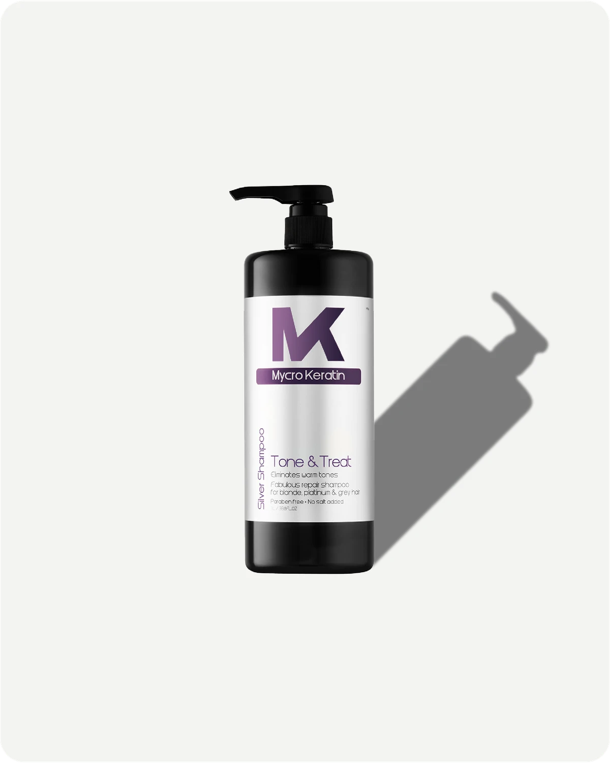 Tone & Treat shampoo 1L bottle with pump on a white background