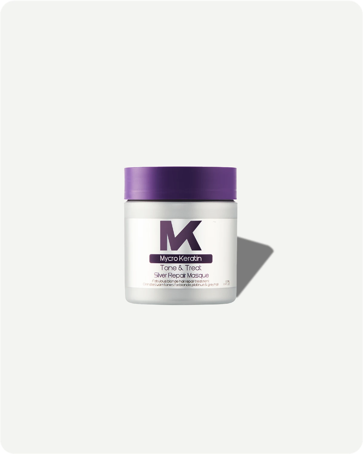 Jar of  Tone and Treat Masque hair product on a white background