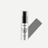 spray bottle labeled 'turn up' by MOYOKO on a white background